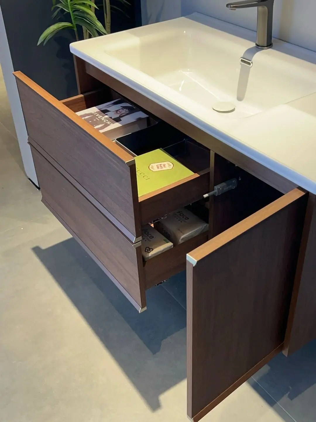 S602 integrated basin and walnut cabinet detail